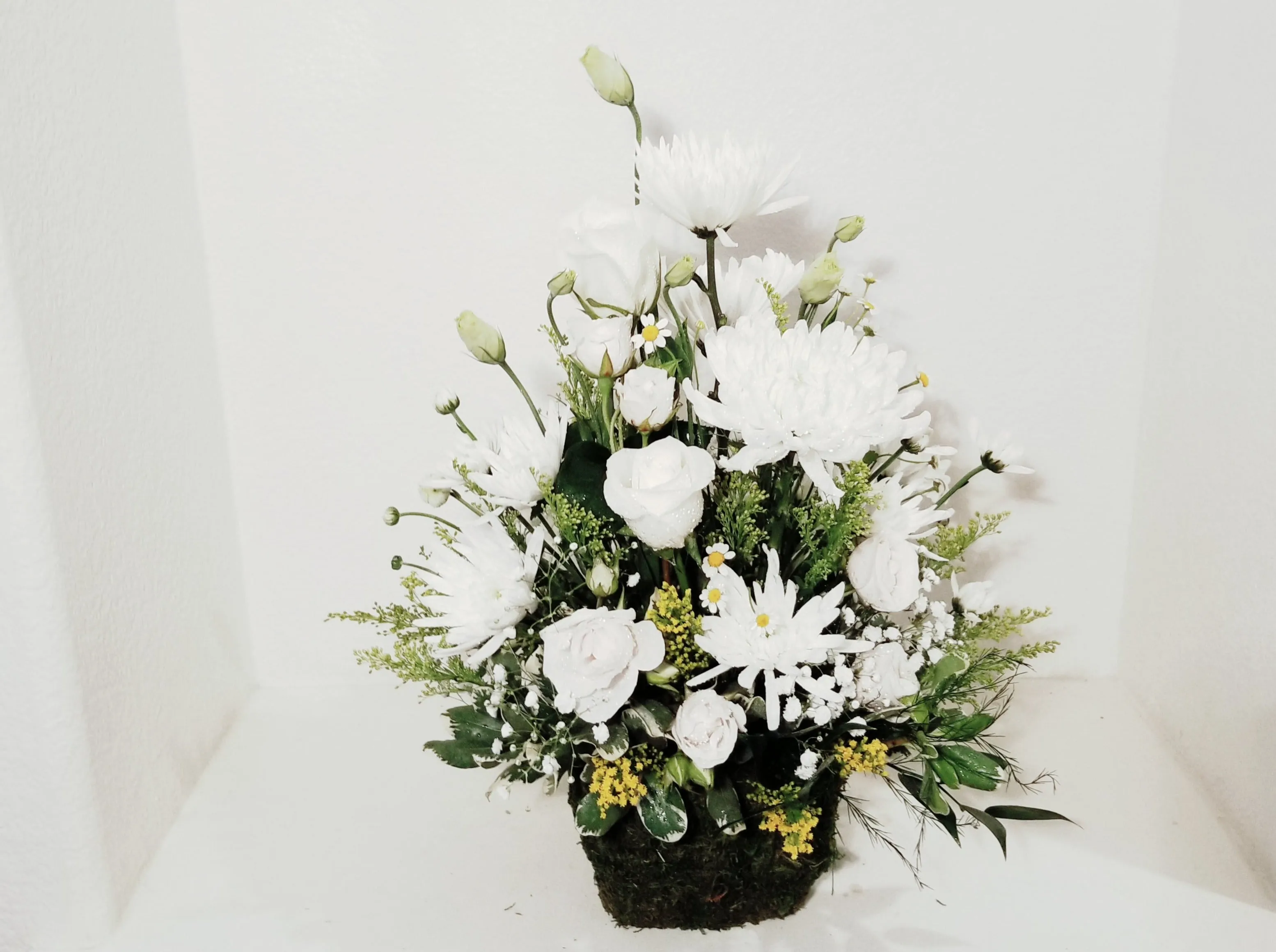 Seasonal White Arrangement in Preserved Moss Basket